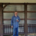 Me in front of tin wall